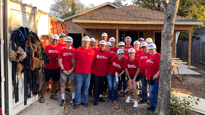 Bank of Texas volunteers working on a Habitat for Humanity home.